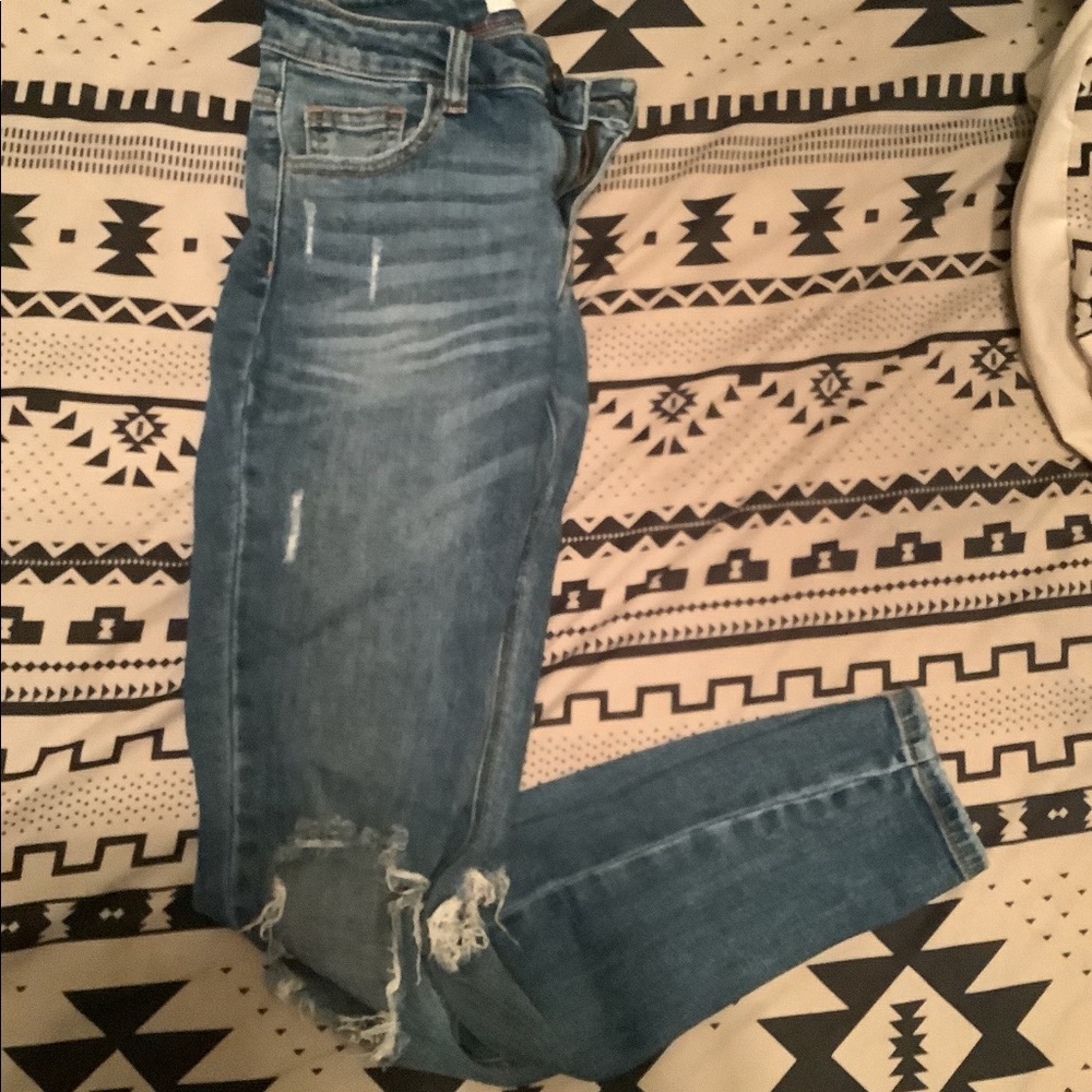 Mid Rise Distressed Ankle Jeans